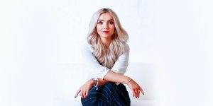 Business image Business woman wearing white blouse and pinstripe trousers