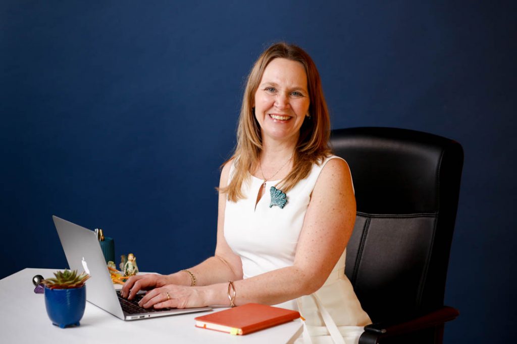 Smiling business woman working at a desk