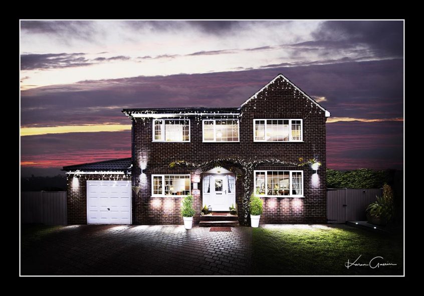 Unique fine art photo of large house using a distinctive lighting technique