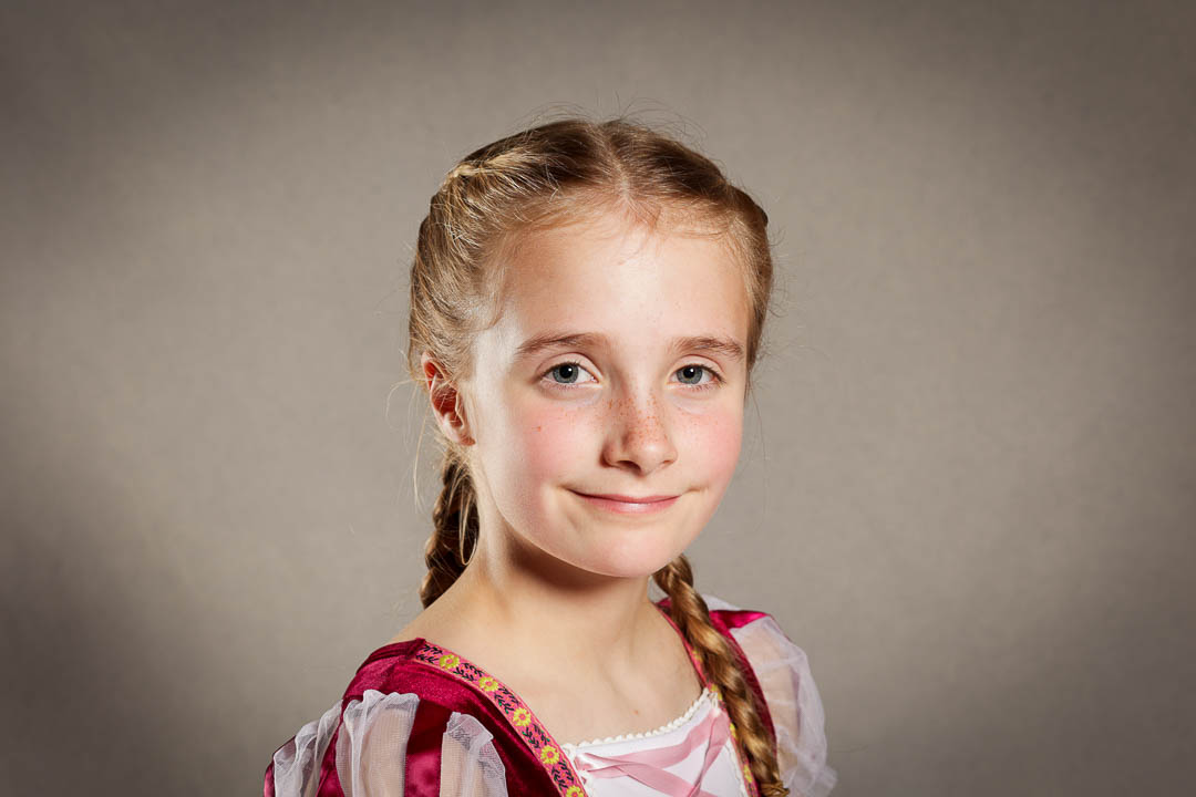 Headshot taken at a dress rehearsal in a portable photography studio set up